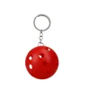 Boule à trous rouge