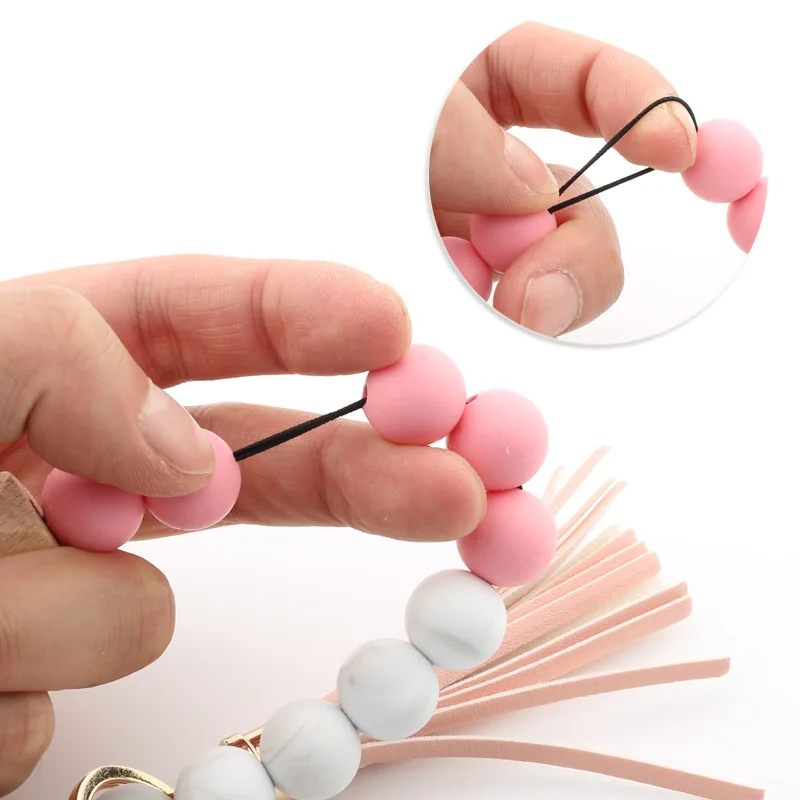 Bracelet Porte-clés En Silicone Pour Femme - Élastique Avec Perles Et Pompon - Gris Et Noir - Accessoire Pratique Et Tendance