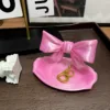 boîte à nœud rose clair