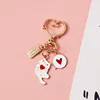 White metal cat keychain A034