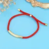Ciondolo in oro+cordone rosso