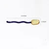 Cucchiaio ambrato da 16 cm con manico blu scuro