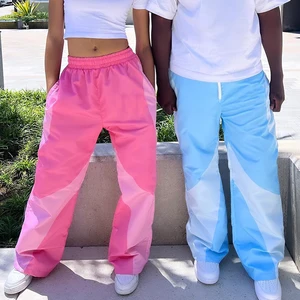 Manufacturer Wholesale Unisex Oversized Fit Wide Leg Track Pants  Color Block Men Sports Pants Baggy Nylon Track Pants