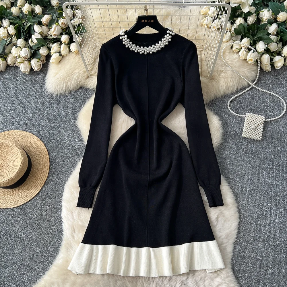 black knit dress with white trim 1960s Victoria Royal Black Knit Dress and Vest Ensemble with Fox Hem and Cuff main image 1