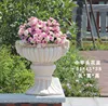 Vaso da fiori con testa di agnello