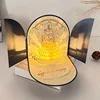 Golden greeting card with lights and music