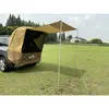 Tente de voyage pour véhicule marron avec tuyaux en fer