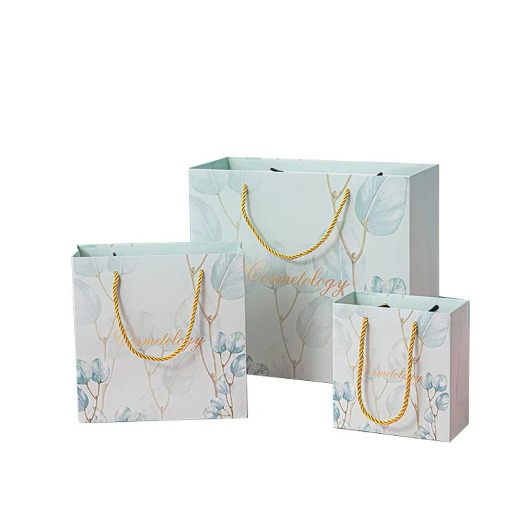 Three cosmetology bags with leaf designs