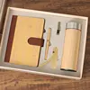 Livre + stylo + disque U + marque-page + ensemble de tasses