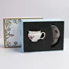 white-cup and saucer