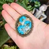 broche azul