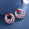 Platinum red corundum earrings
