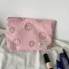 Pink smiley face storage bag