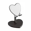New black plastic heart-shaped stand