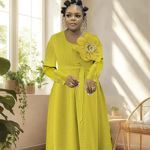 An African Oversized Dress with a Solid-colored Petal Design and Beaded Trim Featuring Miyake Pleated Fabric