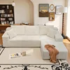 Chaise beige orientada hacia la derecha