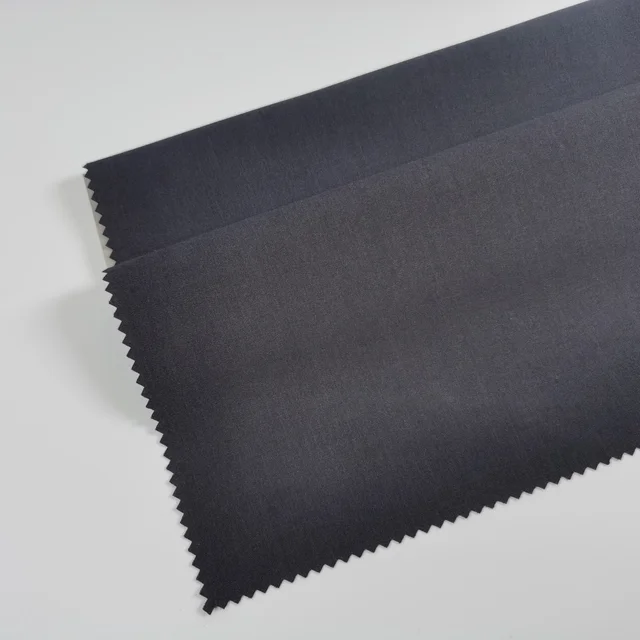 Hot selling polyester rayon wool woven fabric with stretch solid plain suiting Fabric for Suits and Pants