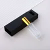 Clear glass spray bottle + gold cap + black box