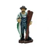 Sailor resin figure takes fish