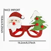 Père Noël, sapin de Noël, lunettes rouges.