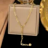 Collana con sfere dorate a catena incrociata h494 in oro