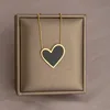 Collana in acciaio titanio con cuore oro-nero