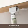 Inverted white magnetic toothpaste dispenser