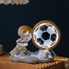 Striving astronaut-soccer
