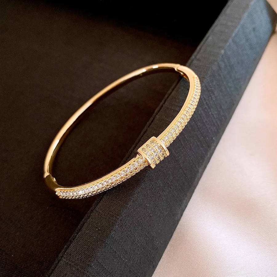 Elegant Gold-Plated Copper Buckle Bangle for Women