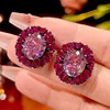 Black gold dried rose ear studs