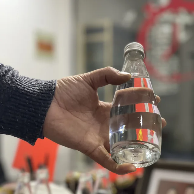 clear drink glass water bottle