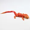 Lagarto de oro rojo de 22,5 cm.