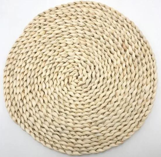 Guangzhou tableware accessories round corn bran table mat woven charger plates