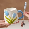 Single cup tulip light blue spoon
