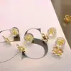 Hoja de trébol de oro de 18 quilates