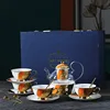 Coffret cadeau théière fleurie comprenant : 4 tasses O-4, 4 assiettes, 4 cuillères.