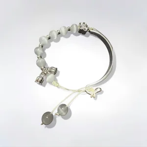 Elegant Handmade Cat's Eye Stone Bracelet with Silver Tone Flower Bell Charms Adjustable Boho Jewelry for Women Unique Gift