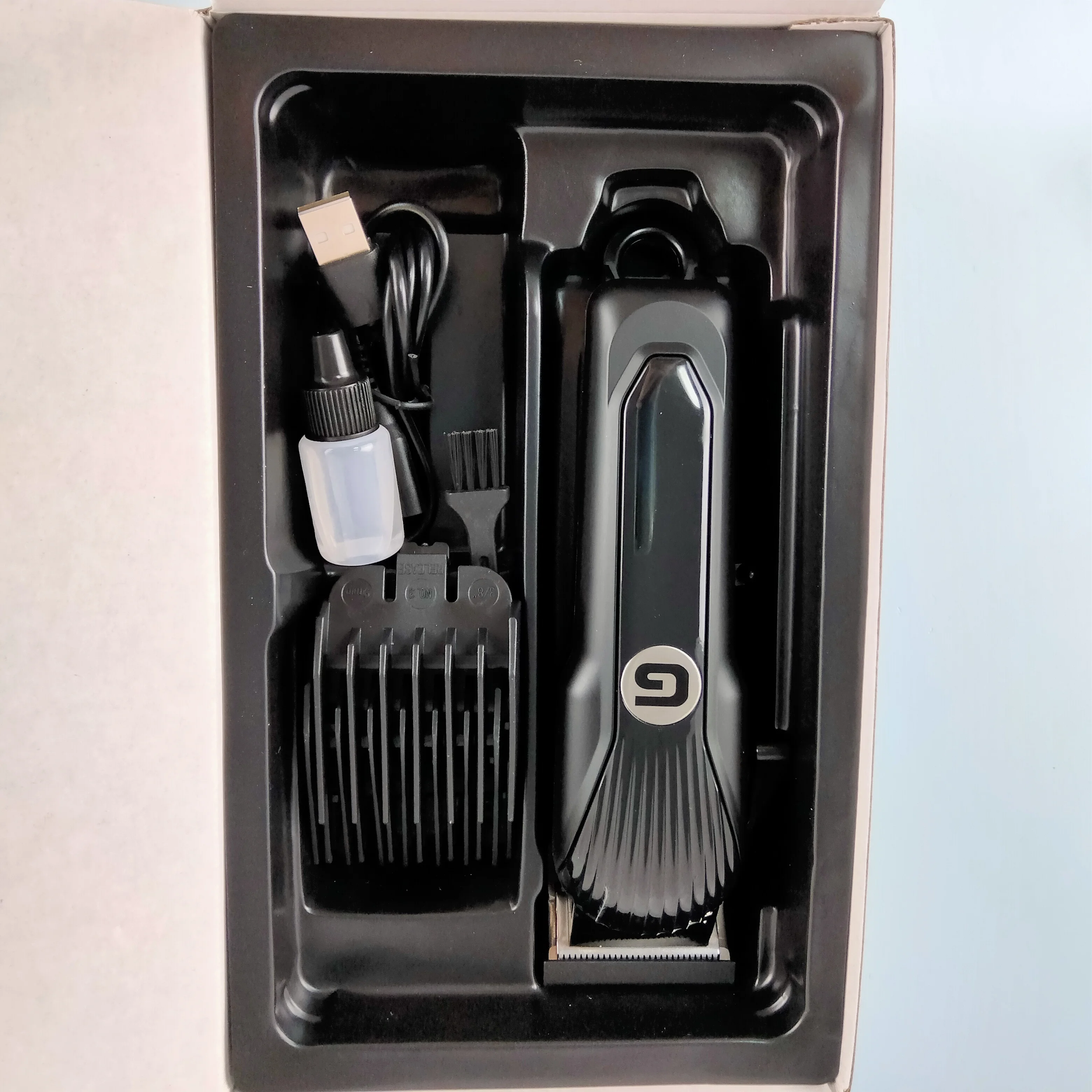View Larger Image Geemy GM-6723  Barber Equipment Professional Cordless Electric Hair Trimmer Rechargeable Hair Clip