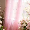 Tenda in tulle rosa con perle