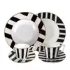 8 inch soup plate, 2 cups and saucers, 2 sets