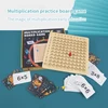 Multiplication practice board with 100 cards