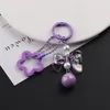Colgante de cuentas redondas moradas