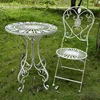A retro white do old tables and chairs-a table and a chair