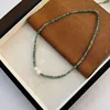 03-i14 Gold natural stone beaded necklace