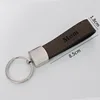 Cuero marrón oscuro en blanco, grabado con láser, metal PLS086-BN