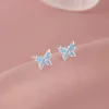 Mariposa que gotea aceite [azul]