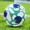 Blue-green pattern patch on white