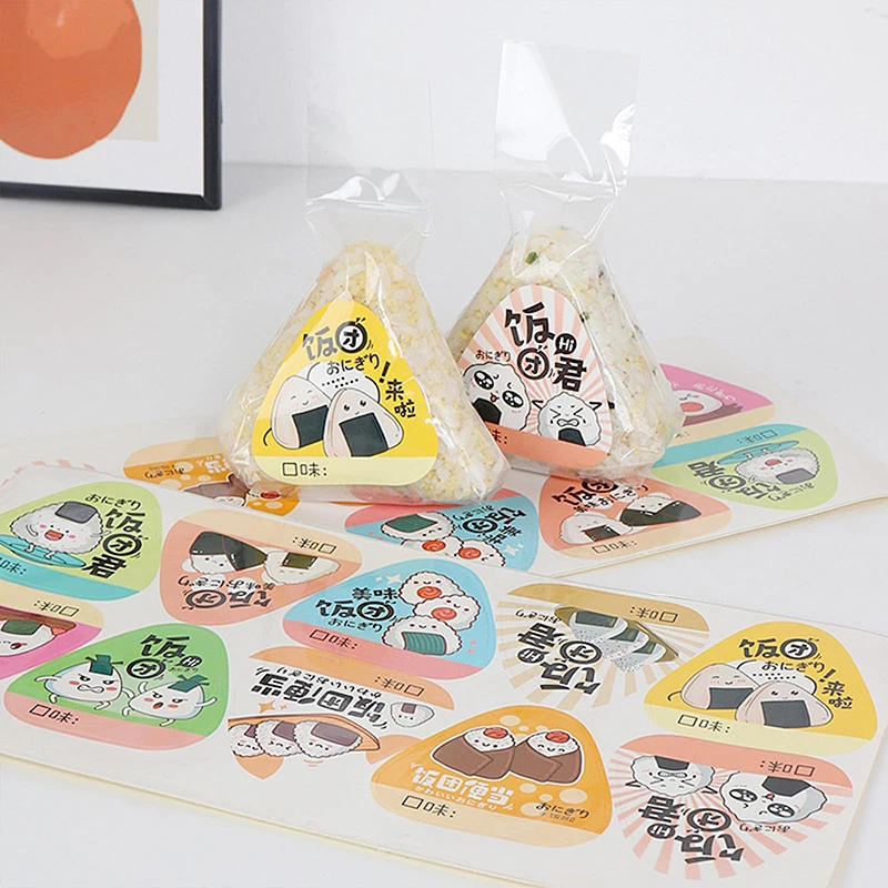 BRATA Triangle Onigiri Wrappers - 100 Pack Disposable Rice Ball Bags With Stickers | Easy-Tear Food-Grade Plastic