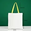 Bolso tote amarillo de 34*38 con asa de lona blanca.