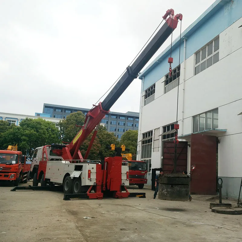 SINOTROK HOWO 8*4 LHD RHD Heavy Duty Emergency Vehicle Road Rescue Truck Rotator Wrecker Towing Truck Manufacturer